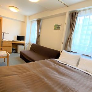 Kamer met een King Size Bed op de Hoek